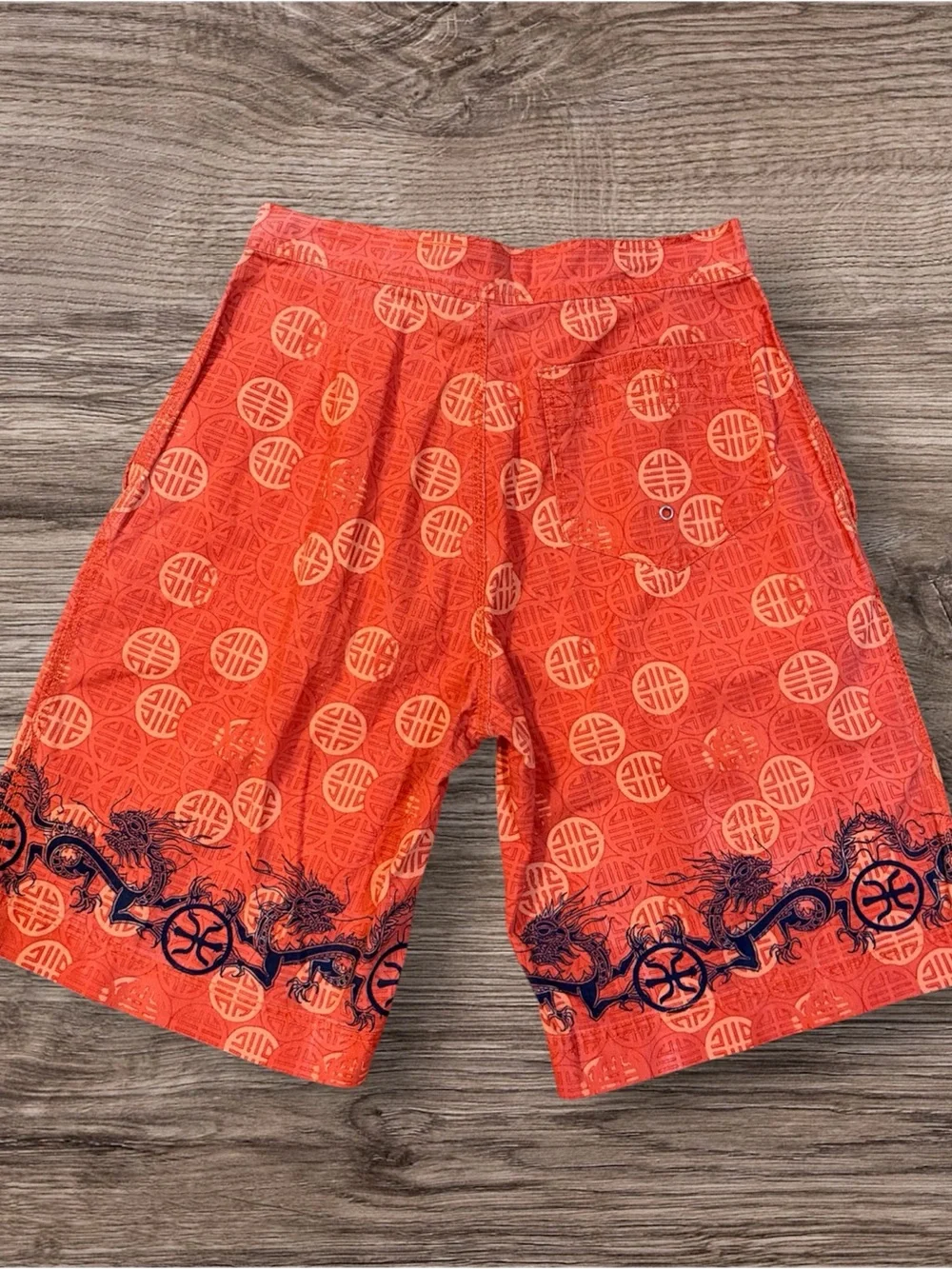 Arizona Jean Company Orange Swim Board Shorts with Navy Dragon Border